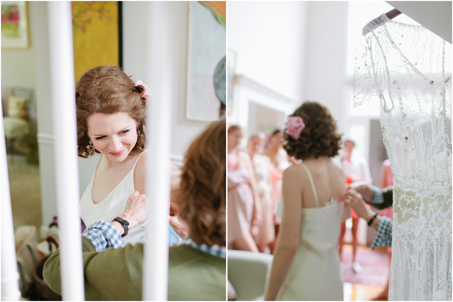 bride putting on jenny packham wedding dress
