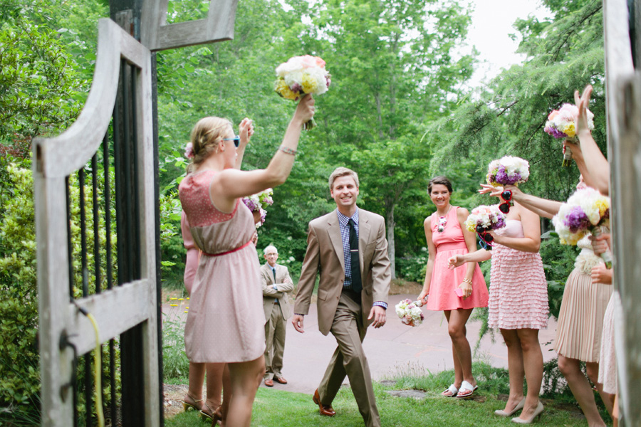 bridesmaids cheering for groom