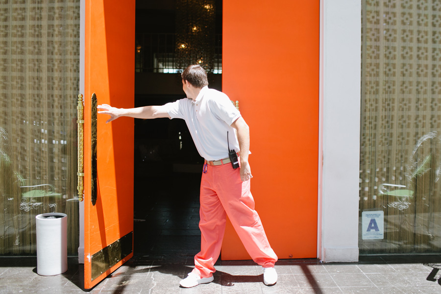coral pants and orange doors at the parker