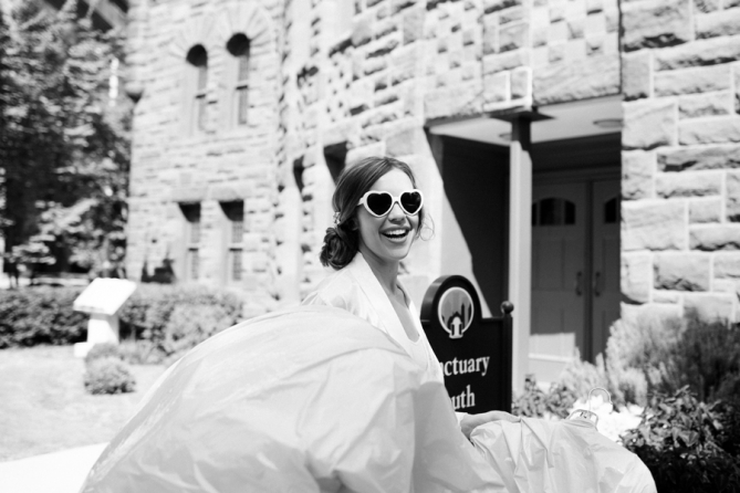 bride in heart-shaped sunglasses