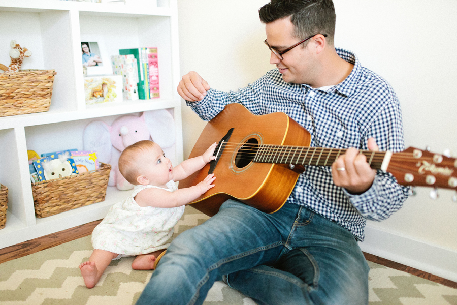 baby and daddy playing guitar