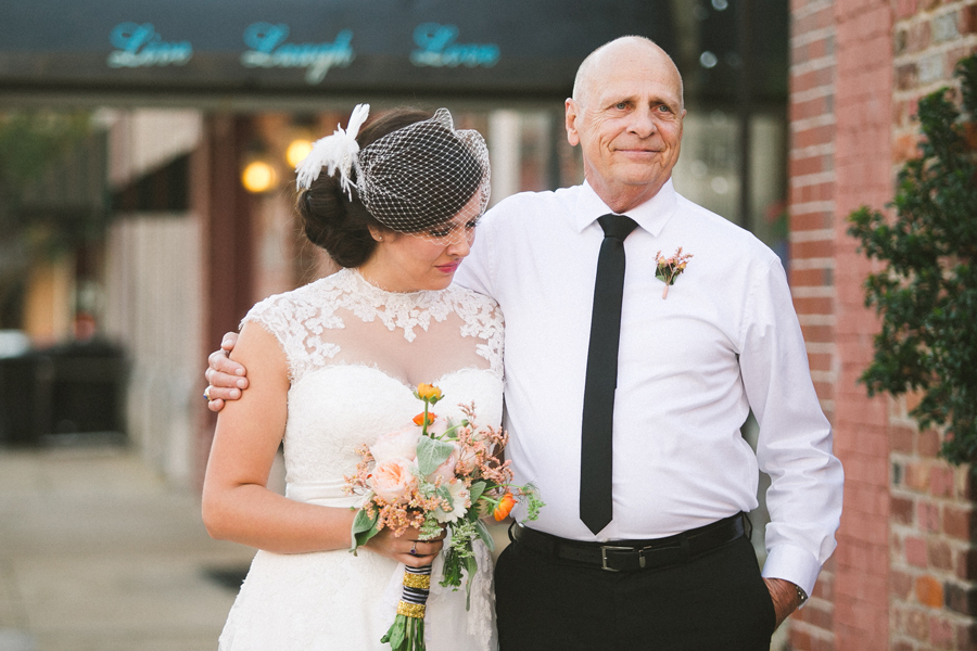 emotional bride and father