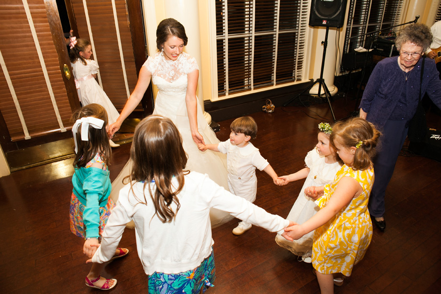 bride dancing with kids
